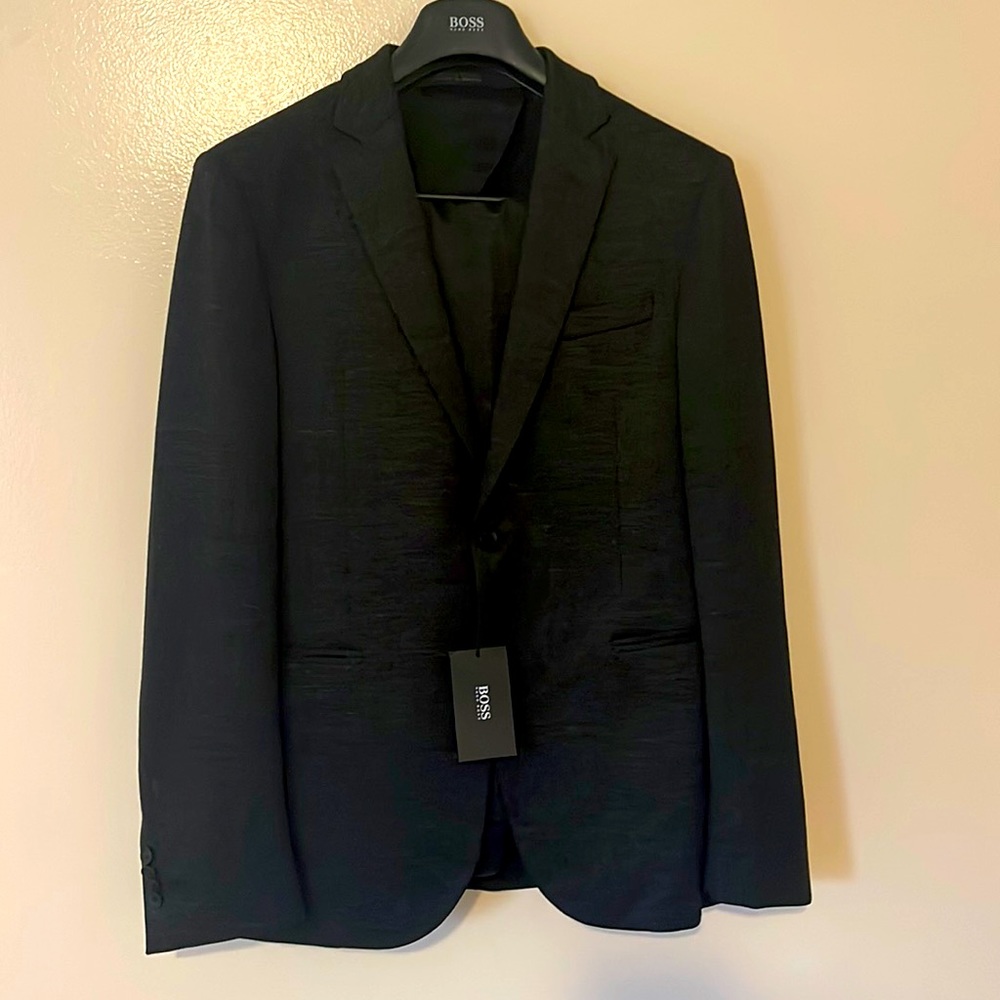 Hugo Boss suit. Charcoal. Size 38R